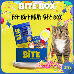 Bite Box Pet Birthday Gift Box with premium cod fish freeze-dried treats, birthday-themed toys, and Bite Passport – perfect birthday surprise for cats and dogs.