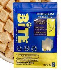 Package of Bite Premium Quality Chicken Cubes pet supplement with chicken cubes in the background